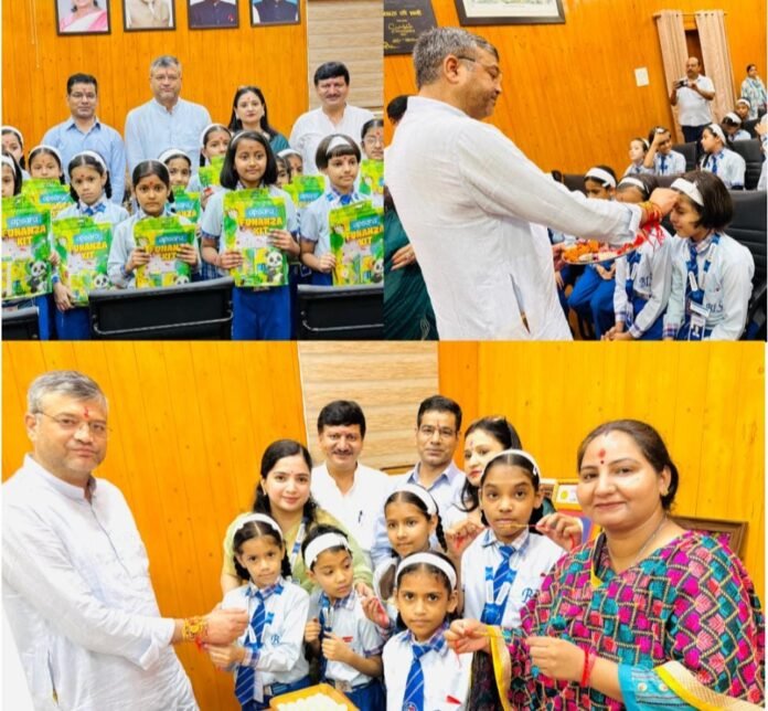 भागीरथी इंटरनेशनल स्कूल के बच्चों ने मेयर सौरभ थपलियाल को बांधी राखी, भाई-बहन के स्नेह का दिया संदेश